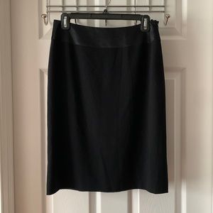 Escada- classic black skirt. Excellent condition. Sharp looking . Lined.